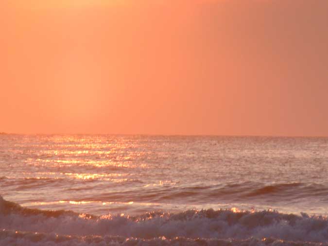 Ocean with Orange Sky